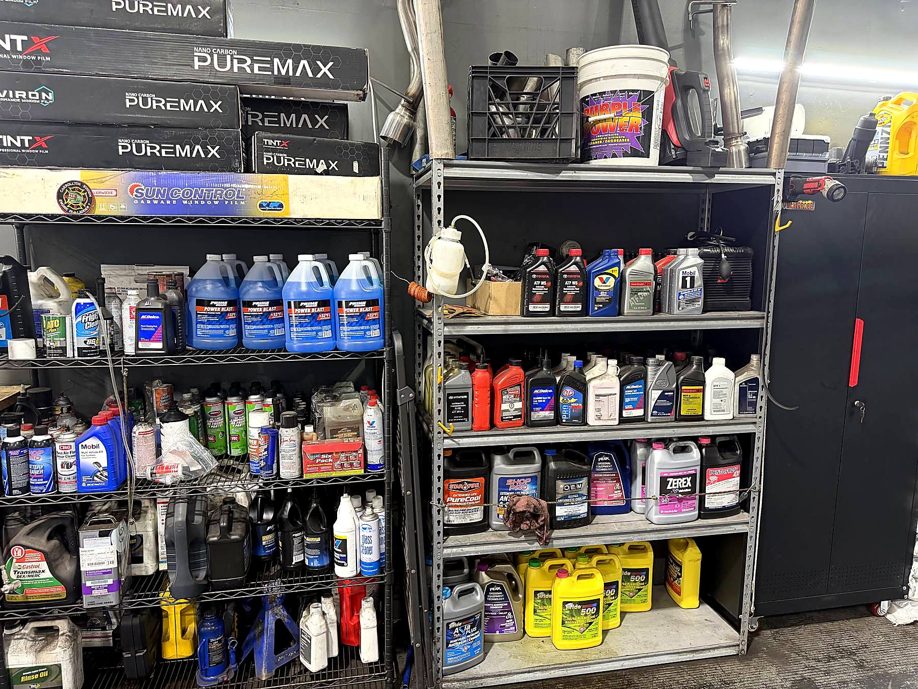 Fluids and parts shelving inside Triple R Auto Repair